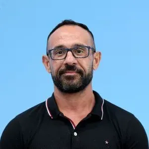 Adrian Farrugia looking straight ahead.