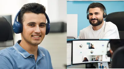 Two men are smiling, wearing headphones in an office. Another person is in a video call on a computer, displaying several participants on the screen.